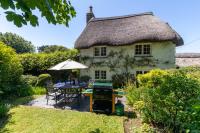 Putsborough Manor 3 Self Catering Cottages with Beach a short walk dog friendly all year, On site Tennis, Play Area, Paddock, Spa baths, BBQ, Private Gardens, Superfast WIFI - Ferienwohnung