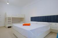 Camera Quadrupla con Vista Giardino 