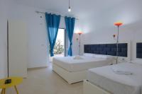 Dreibettzimmer mit Stadtblick