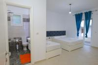 Camera Tripla con Vista Città