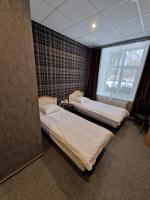 Tweepersoonskamer met 2 Aparte Bedden