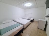 Chambre Quadruple avec Salle de Bains Privative