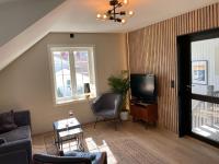 Nice apartment close to the sea with parking and garden - B&B Arendal