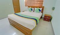 B&B Guruvāyūr - Treebo Trend Sreepathi Nirmalyam 1 Km From Guruvayoor Railway Station - Bed and Breakfast Guruvāyūr