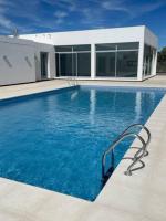 Departamento Nuevo- Piscina Techada- Climatizada - Confort y Calidad a metros del mar - Chambres d'hôtes Puerto Madryn