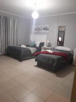 Stay at Home Airport Lodge - Chambres d’hôtes