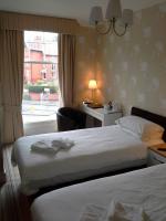 Tweepersoonskamer met 1 of 2 Bedden en Eigen Badkamer