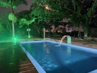 Sítio com piscina Hidromassagem com acesso ao Rio Mampituba - B&B Passo de Torres