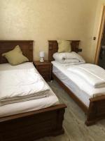 Tweepersoonskamer met 2 Aparte Bedden