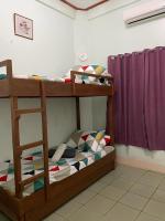 Tweepersoonskamer met 2 Aparte Bedden en een Extra Bed