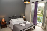 Andros Guesthouses - B&B Andros