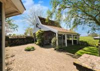 Idyllisch en knus huisje met prachtige veranda. - Bed and Breakfast Oterleek