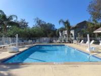 W2 Ocean Walk Resort upstairs 2 bed king and two twins next to back pool - B&B Saint Simons Island