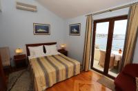 Doppelzimmer mit Balkon und Meerblick