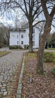 Penthouse in Villa am Wasser + Parken + WLAN + Netflix +Kamin - Ferienwohnung