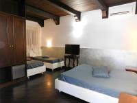 Quadruple Room with Private Bathroom