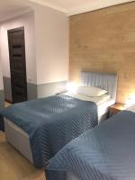Tweepersoonskamer met 2 Aparte Bedden