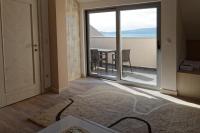 Duplex Three-Bedroom Apartment with Balcony and Sea View