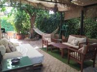 Dormir entre limones, Casa de invitados en vivienda familiar - Ferienwohnung