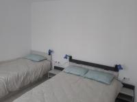 Dreibettzimmer mit Gemeinschaftsbad