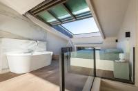 Appartement 100M2 dernier étage - chambre atypique - B&B