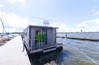 B&B Schleswig - Hausboot Fjord Serina mit Biosauna in Schleswig - Bed and Breakfast Schleswig