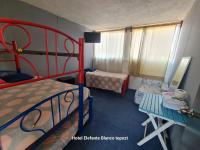 Quadruple Room with Shared Bathroom