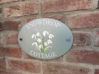 Snowdrop Cottage - Part of the The Bay Filey Holiday Village with pool, gym and direct beach access, pub, restaurant, tennis and meadows walks - Chambres d'hôtes Filey