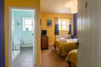 Tweepersoonskamer met 2 Aparte Bedden