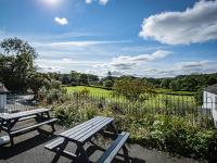 Kamer met Kingsize Bed en Uitzicht op de Tuin