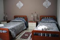 Tweepersoonskamer met 2 Aparte Bedden