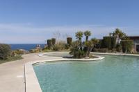 LETS HOLIDAYS Pool and sea views apartment with 1 parking space - Chambres d'hôtes Tossa de Mar
