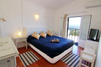Kamer met Queensize Bed en Uitzicht op het Platteland
