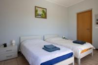 Chambre Lits Jumeaux avec Toilettes Communes