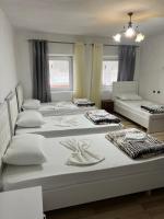 Chambre Quadruple avec Salle de Bains Privative
