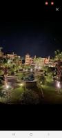 وحده فندقية باطلالة على حمام السباحة فى فيرندا سهل حشيش ريزورت - B&B