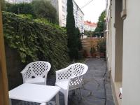 Apartamento con pequeño jardín en el centro - B&B