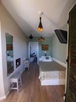 Chambre Deluxe (1 Adulte + 1 Enfant)