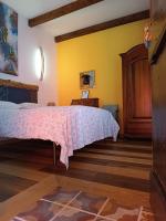 Camera Matrimoniale con Vista Giardino