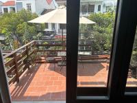 Habitación Doble con balcón (2 adultos + 1 niño)