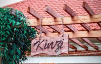 Kinzi Apartments Bar & Gardens - Chambres d’hôtes