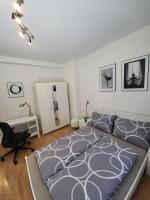 One-Bedroom Apartment with Balcony and City View