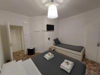 Dreibettzimmer mit eigenem Bad