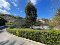 Piscina comunitaria y parking en Mogro - Chambres d’hôtes Mogro