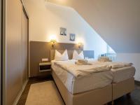 Dünenpark Binz - Komfortplus Ferienwohnung mit 1 Schlafzimmer und Balkon im Dachgeschoss 113 - B&B Ostseebad Binz