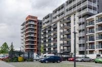 LupoApartments Premium z Klimatyzacją, Jacuzzi w Sypialni Manufaktura Parking Dostęp na Kod - Chambres d'hôtes Łódź