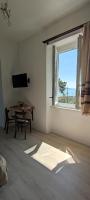 Habitación Doble Deluxe con balcón y vistas al mar