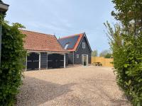 B&B Biggekerke - Vakantiehuis T Koetshuis - Bed and Breakfast Biggekerke