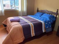 Departamento en el centro de la ciudad de Baños con netflix, wifi, garage gratuito y una excelente vista - B&B