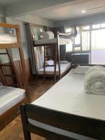 Einzelbett im gemischten Schlafsaal